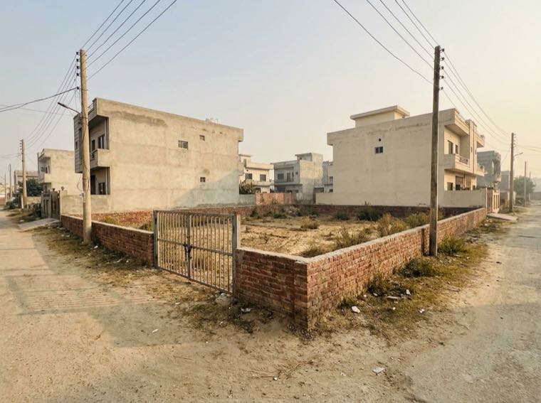 Sample photo of a vacant walled plot